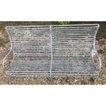 A pair of wrought iron slatted metal benches 174 cm wide (ex Burford Garden Centre)