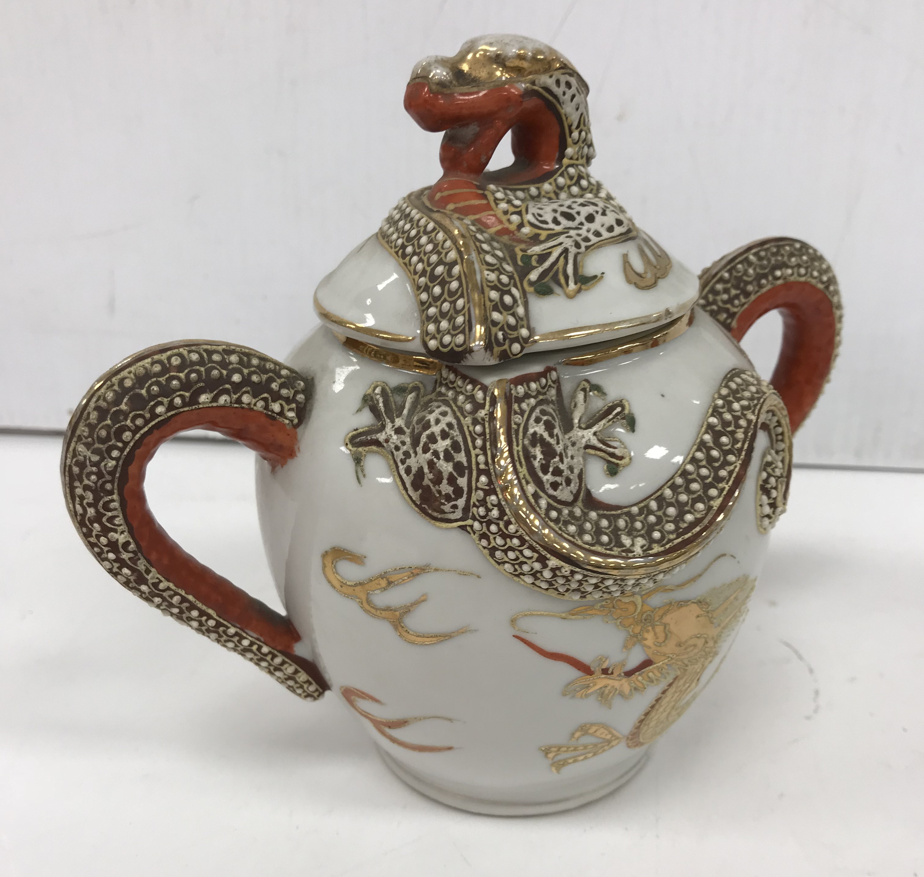 A collection of various Japanese and Chinese pottery and porcelain including a Japanese dragon - Image 6 of 10