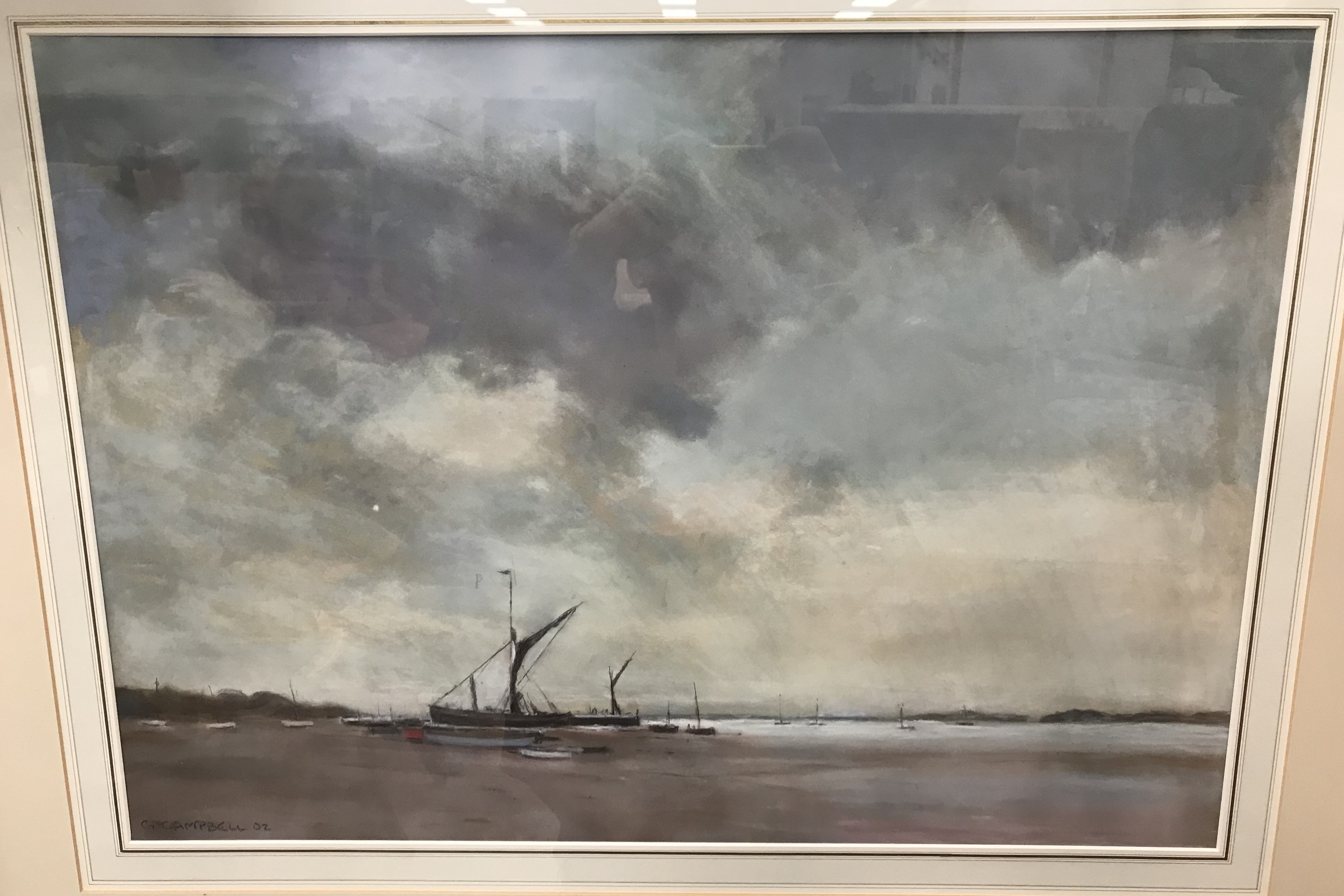 G CAMPBELL "Coastal scene with beached vessels in foreground, grey clouds above" pastel,