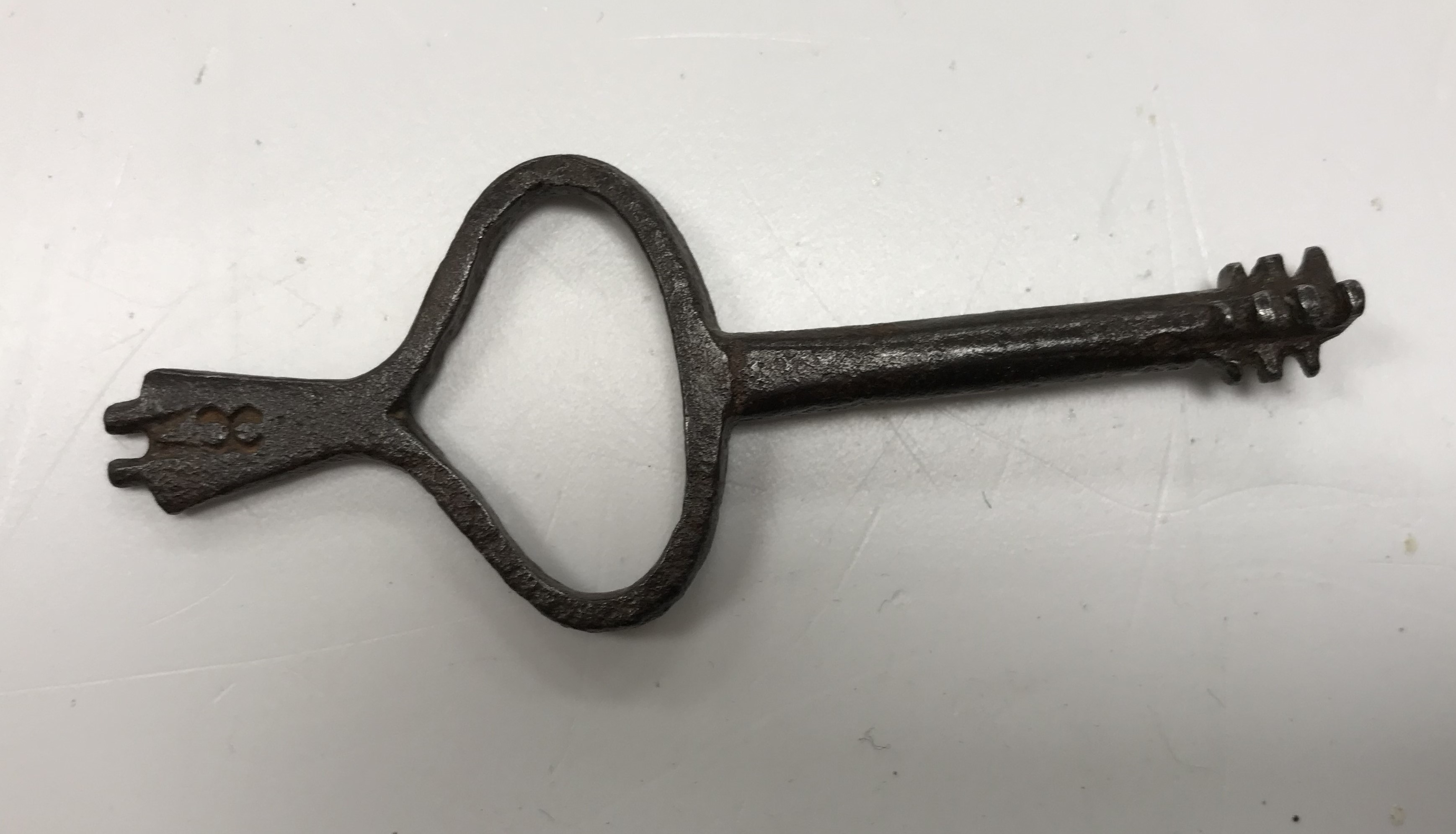 An 18th Century slave or restraint key stamped “8” to one end,