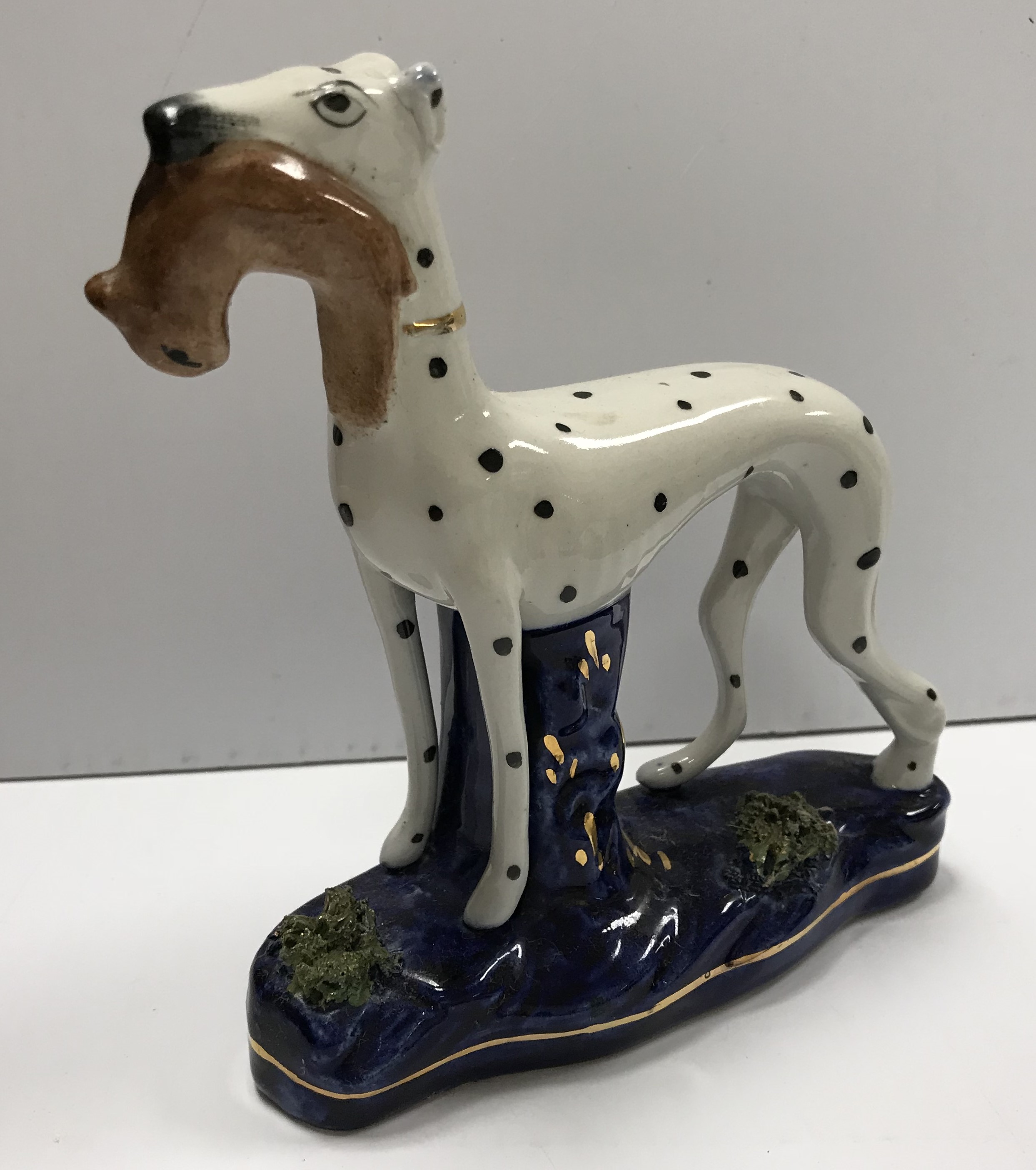 A pair of late 19th Century Staffordshire pottery figures of seated dalmatians as inkwells 18. - Image 2 of 5