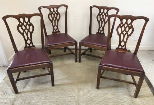 A set of four mahogany framed Provincial Chippendale style dining chairs with pierced back splats