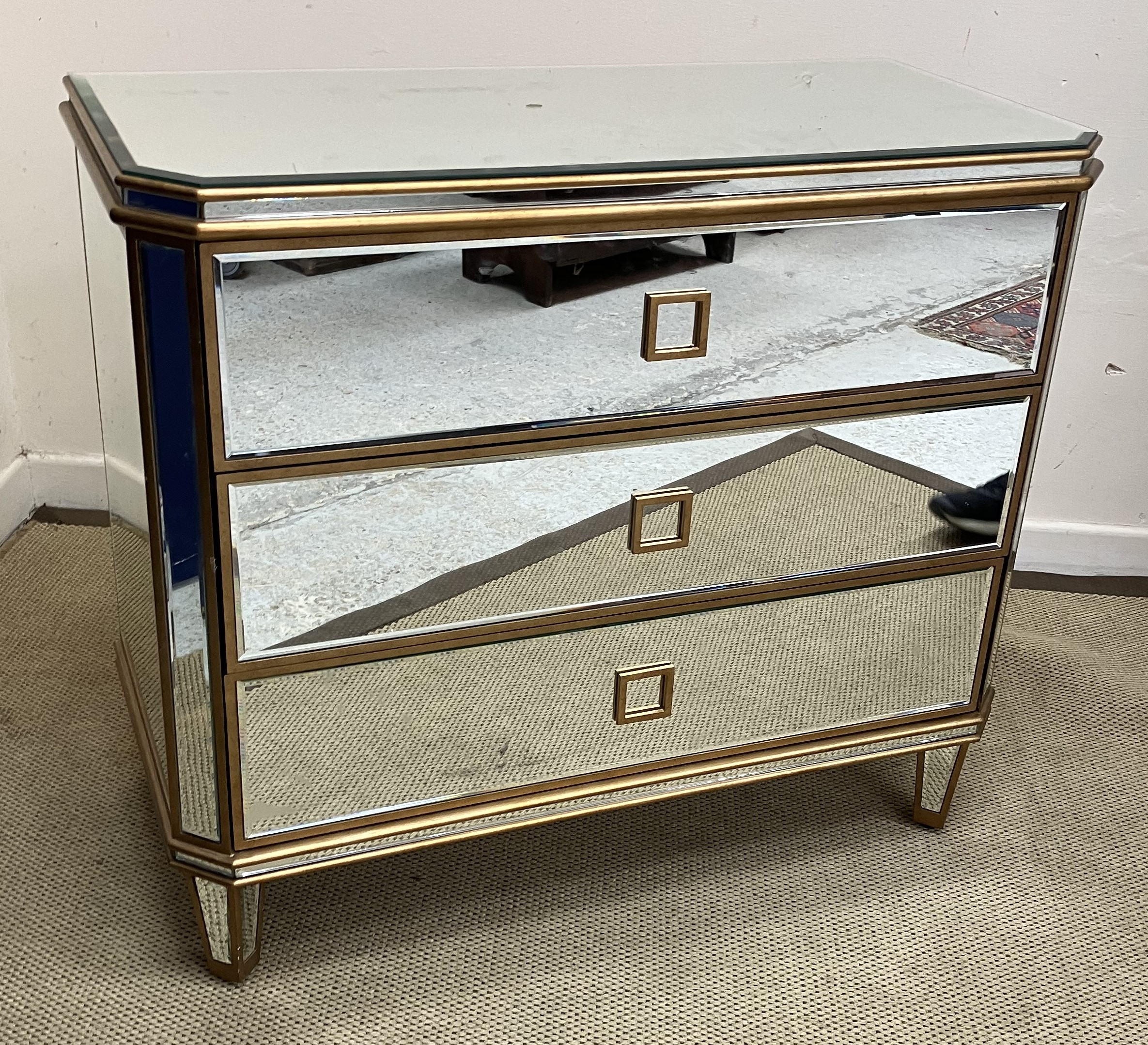 A modern mirrored and gilded chest of three long drawers on square tapered legs, - Image 3 of 3