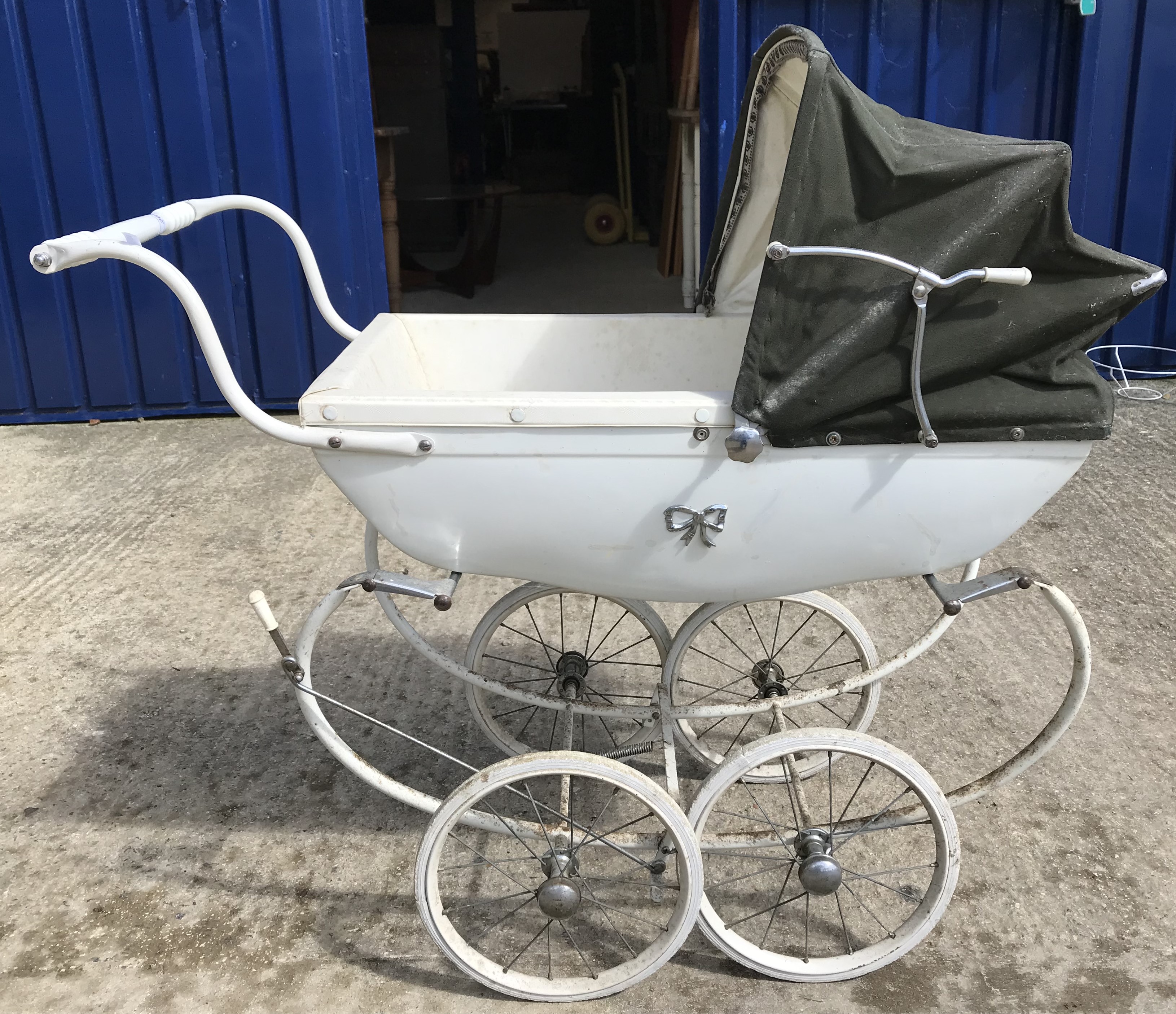 A Silver Cross dolls' pram of typical form, a treen ware wheelbarrow bearing ivorine tag "W.B. - Image 2 of 7