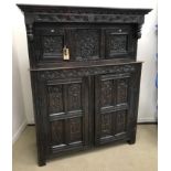 A 17th Century Lake District/Lancashire carved oak court cupboard,