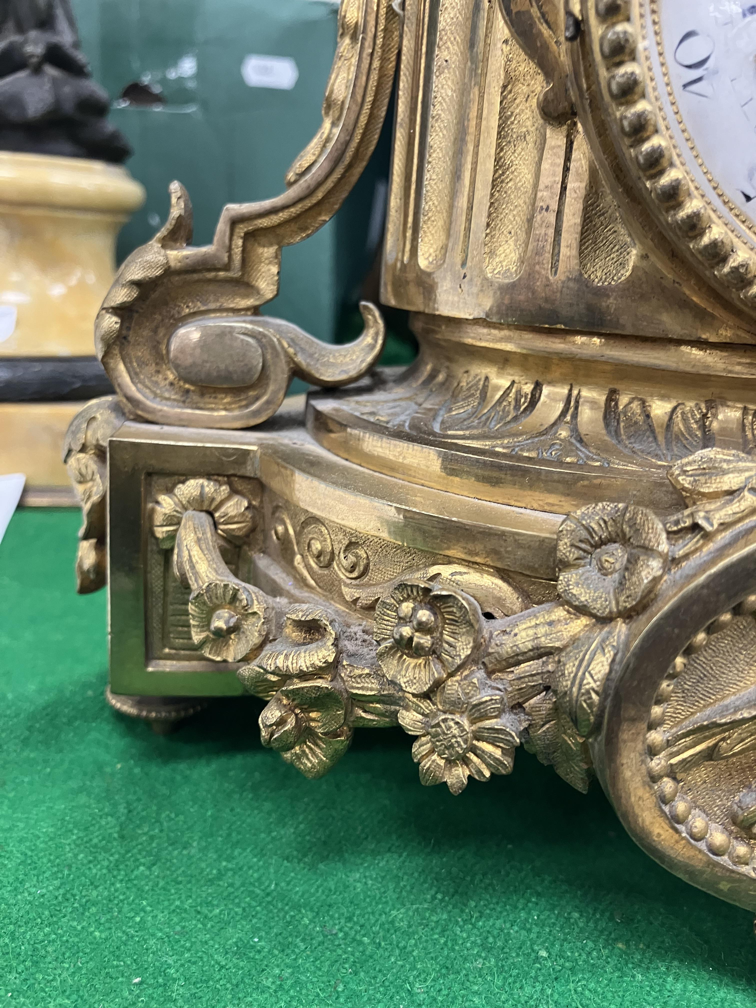 A 19th Century French gilt brass cased mantel clock, - Image 23 of 34