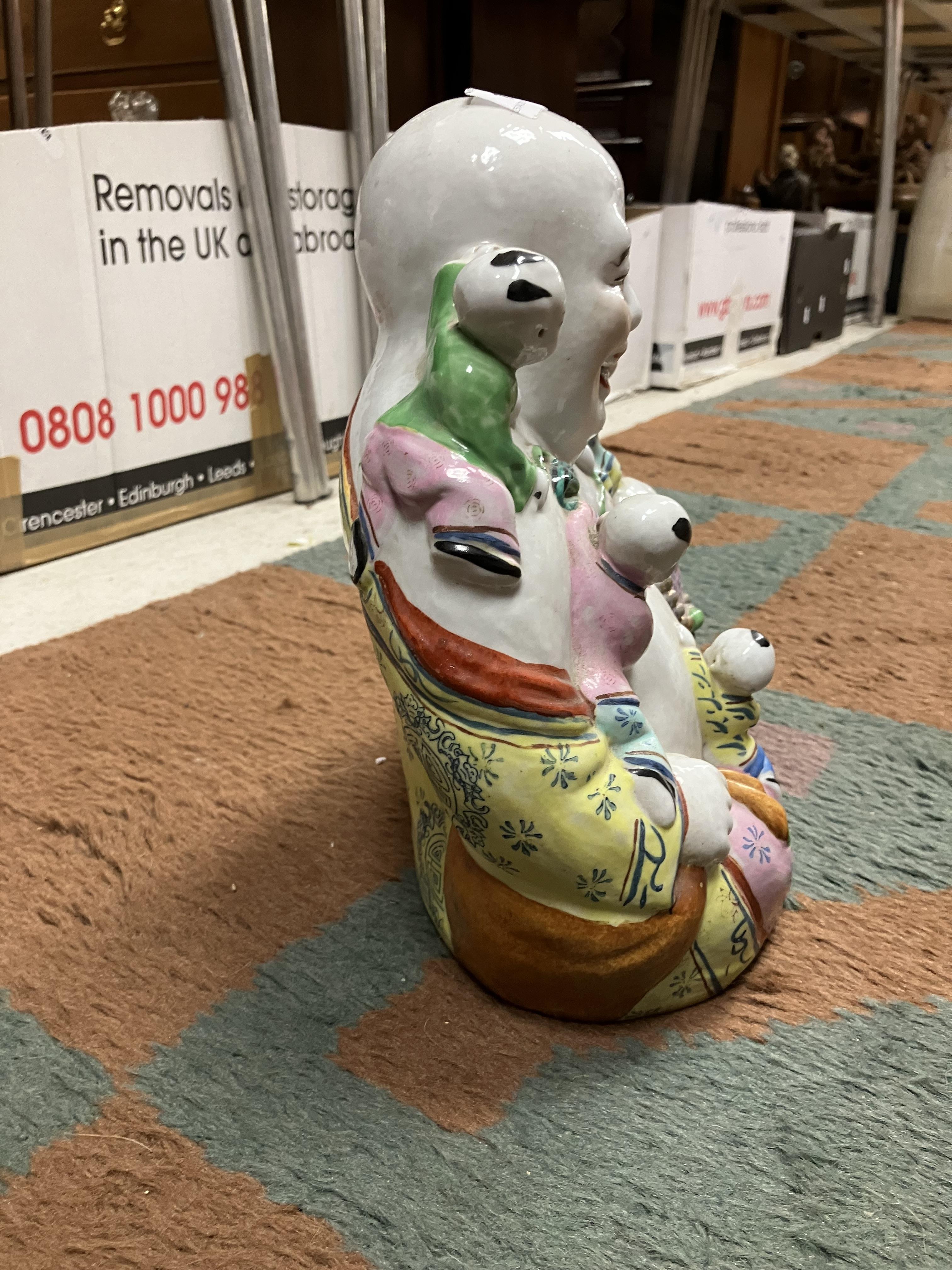 A Chinese polychrome decorated figure of a seated Buddha with five children bearing impressed four - Image 11 of 29