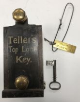 A Chubb top lock key safe with sliding cover over a glass panel together with a vintage key