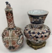 A 19th Century Japanese gourd shaped vase with ribbon tied decoration to the main body and