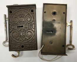 A Gibbons of Wolverhampton brass asylum type lock and key and an ornate cast iron door lock with
