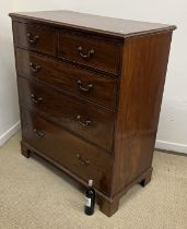An Edwardian mahogany and satinwood strung chest of two short over three long graduated drawers,