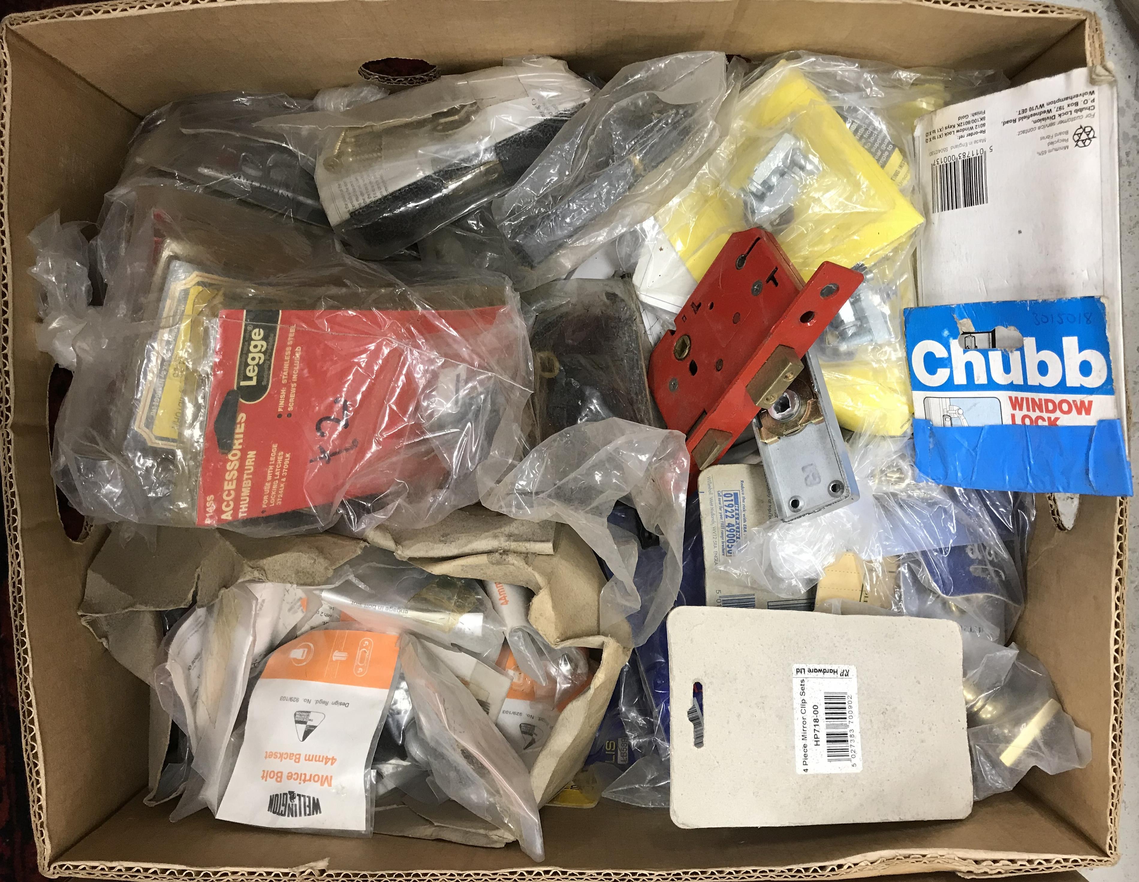A box of assorted door furniture/fittings etc