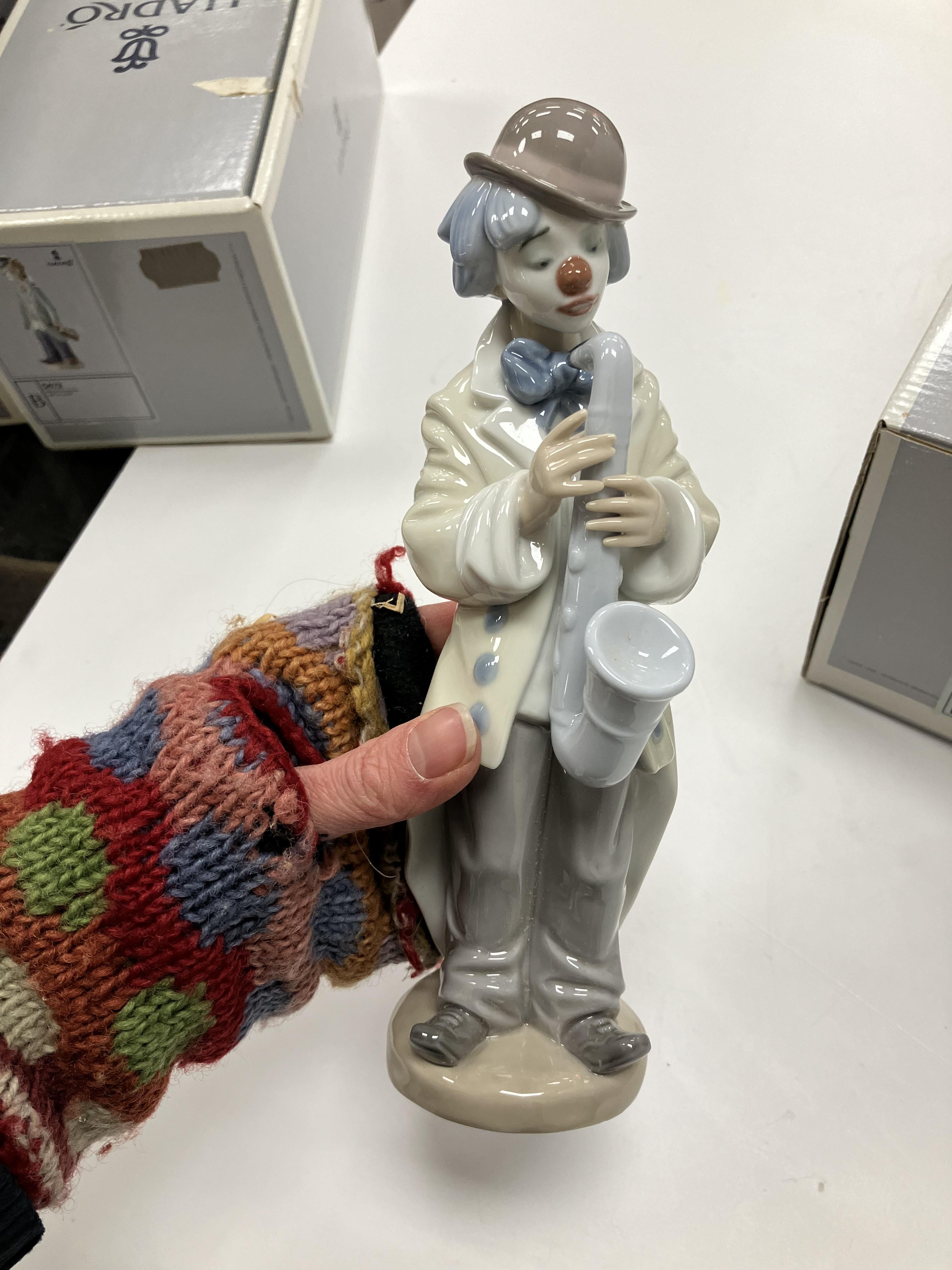 A collection of four Lladro figures "Circus Sam" (No. 5472), "Surprise" (No. - Image 19 of 29