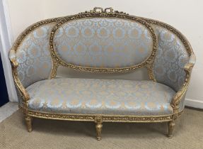 A 19th Century French carved giltwood and gesso framed canapé in the Louis XVI taste,