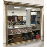 A 20th Century carved giltwood and gesso framed over mantel mirror,