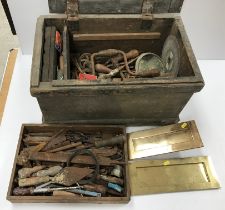A vintage pine trunk / tool chest and contents of various old hand tools and two brass letter box