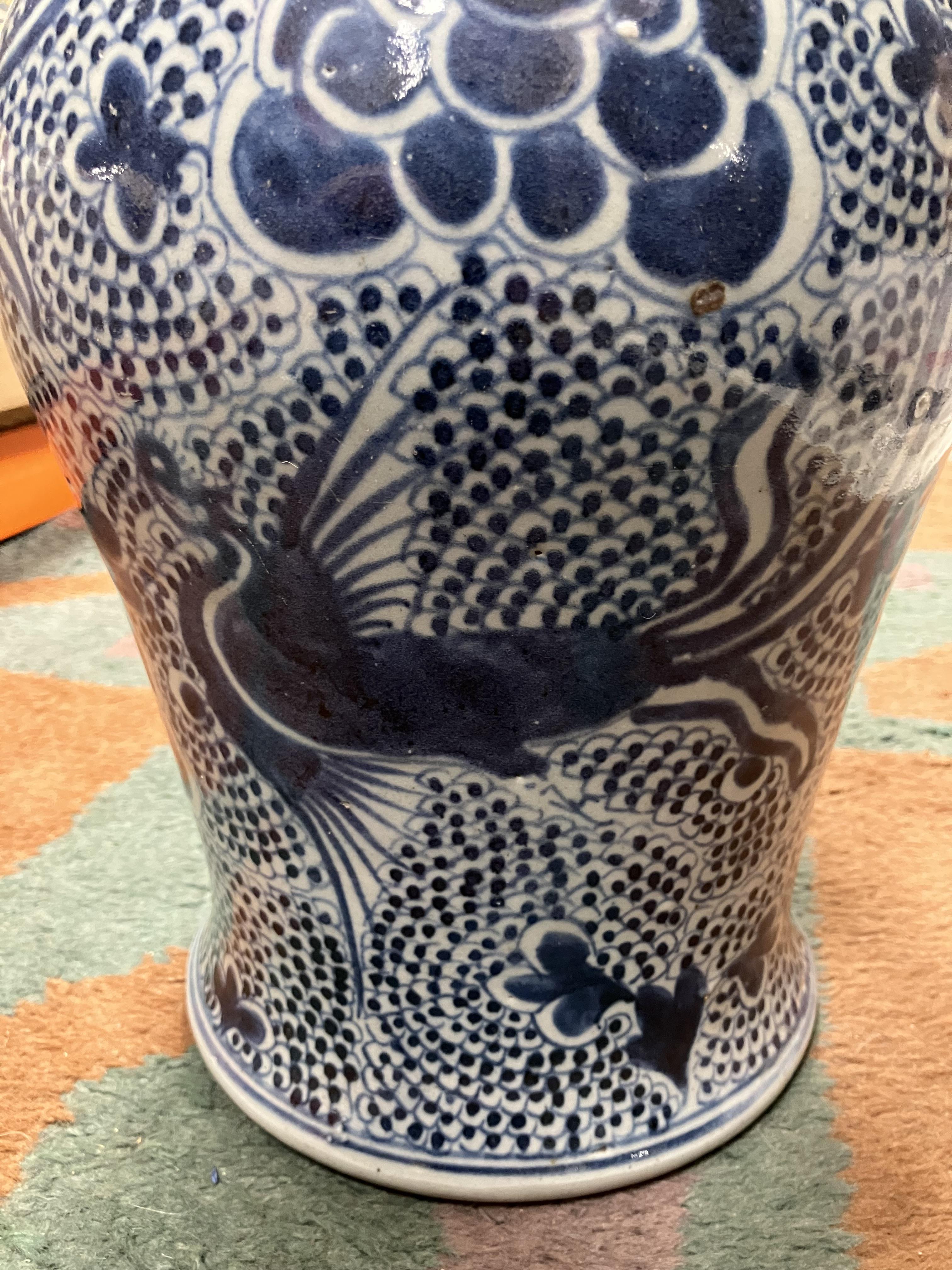 An 18th Century Chinese blue and white baluster shaped vase and cover, - Image 28 of 43