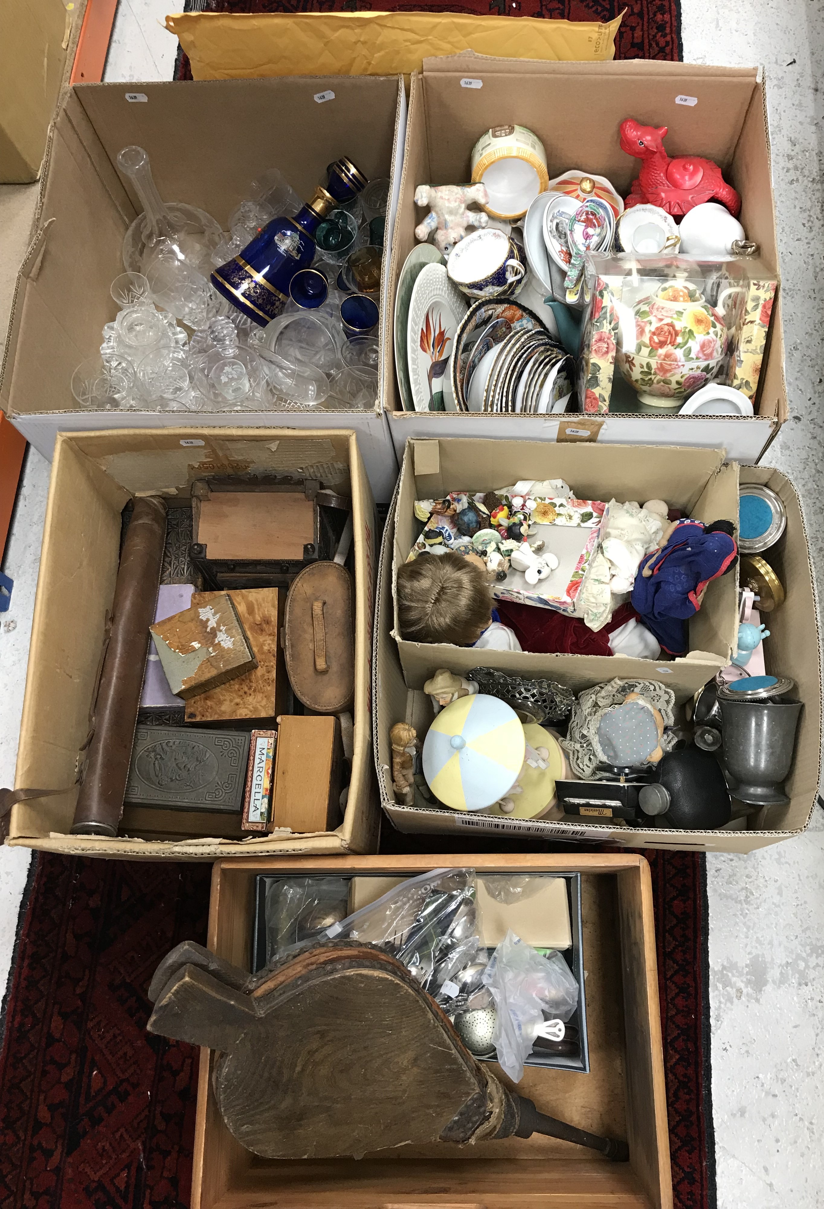 Five boxes of assorted sundry items to include various decorative china and glassware, dolls,