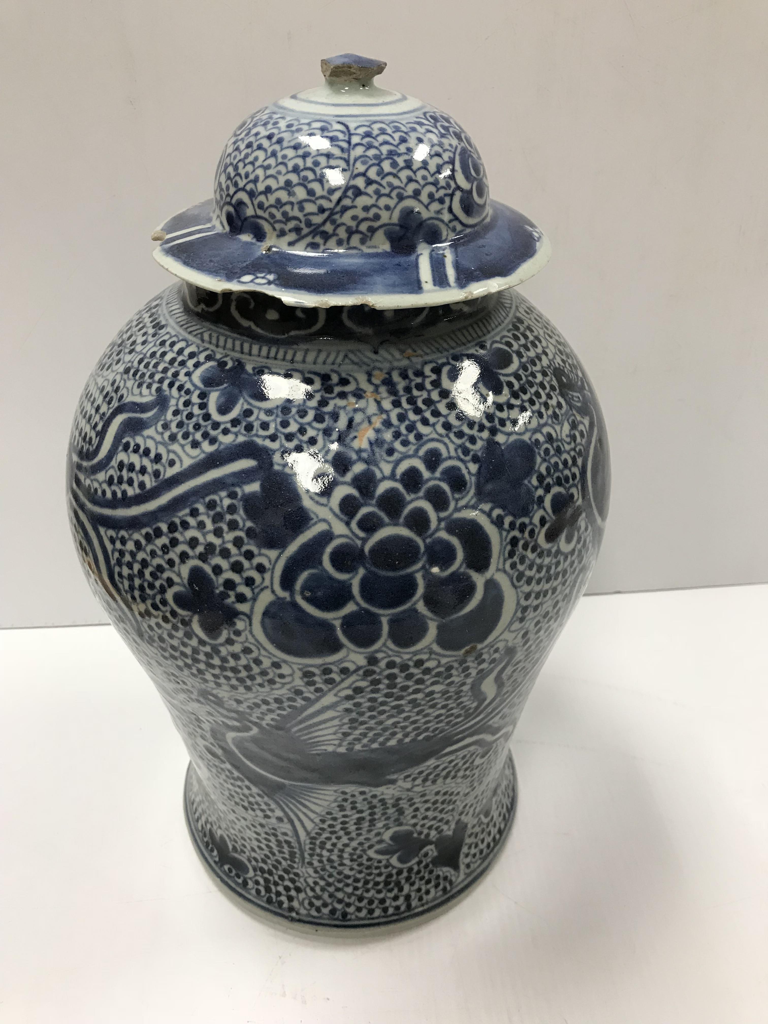 An 18th Century Chinese blue and white baluster shaped vase and cover, - Image 4 of 43