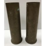 Two World War II trench art brass shell case vases, each decorated with incised foliate sprays,