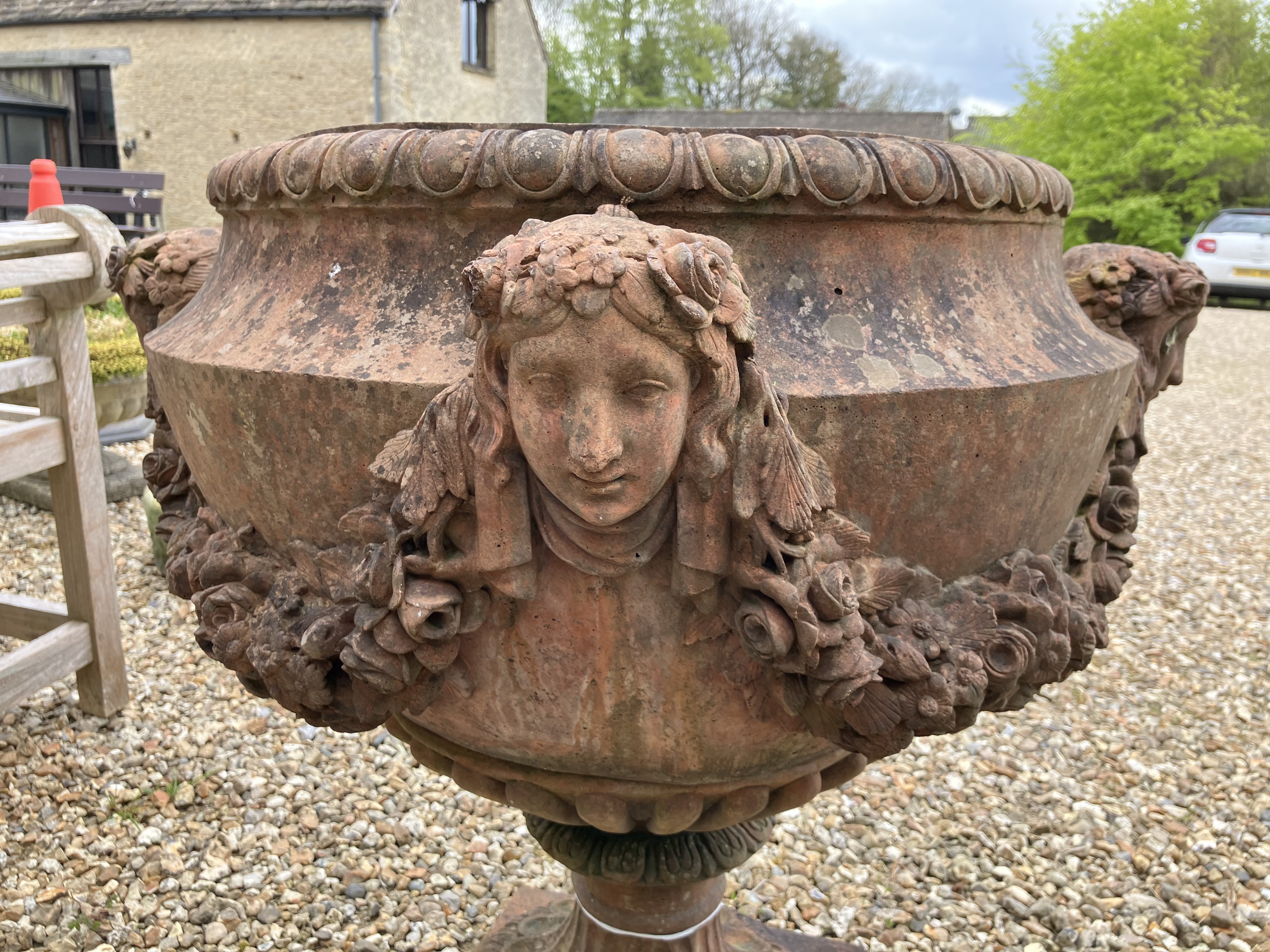 A terracotta style urnin the classical manner with 'Flora' mask and floral swag decoration 82 cm - Image 12 of 41