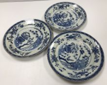 A set of three 19th Century Chinese blue and white export ware plates,
