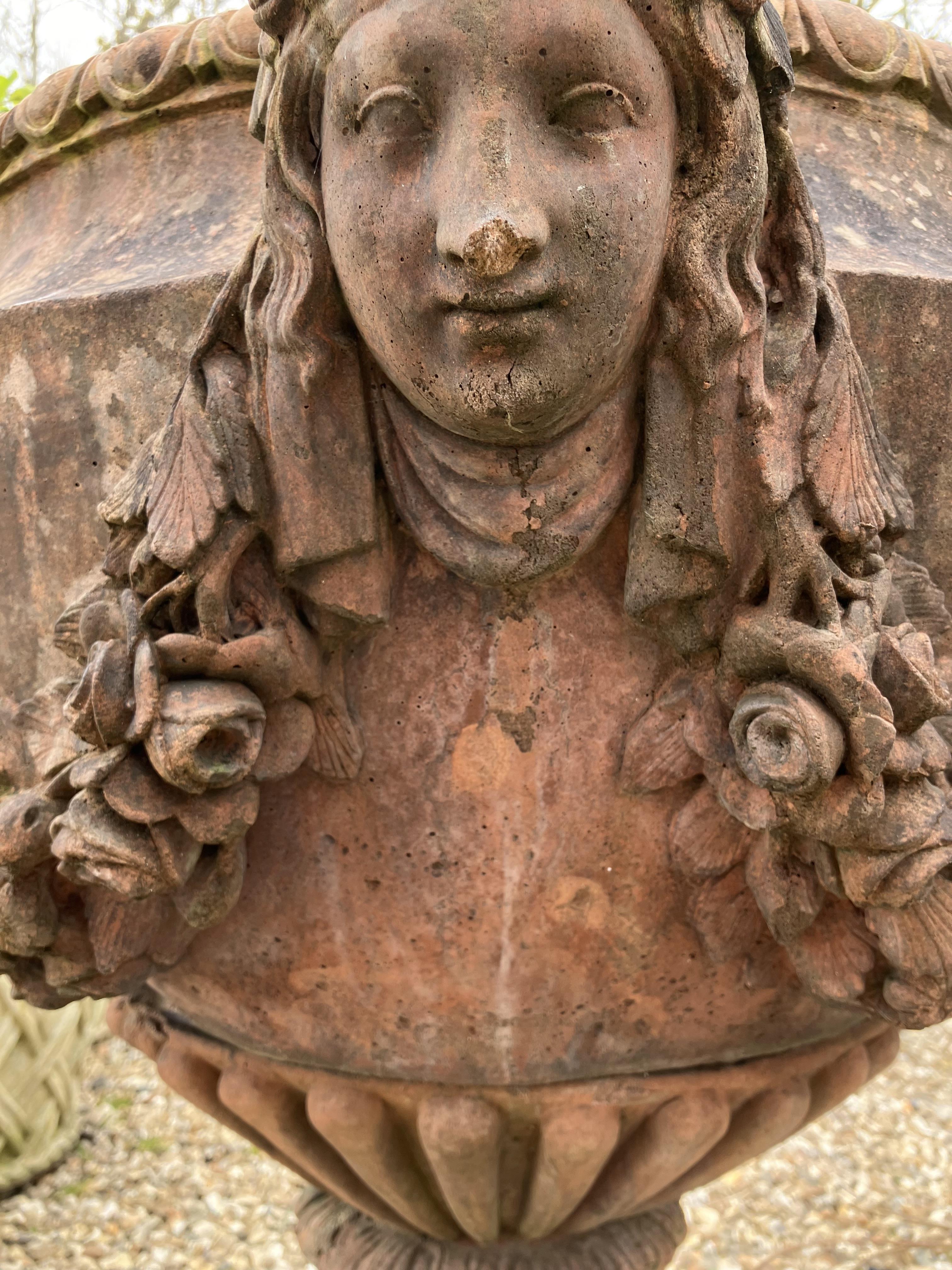 A terracotta style urnin the classical manner with 'Flora' mask and floral swag decoration 82 cm - Image 30 of 41
