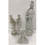A 19th Century Chinese blanc de chine figure of Guanyin 44 cm high together with two further blanc