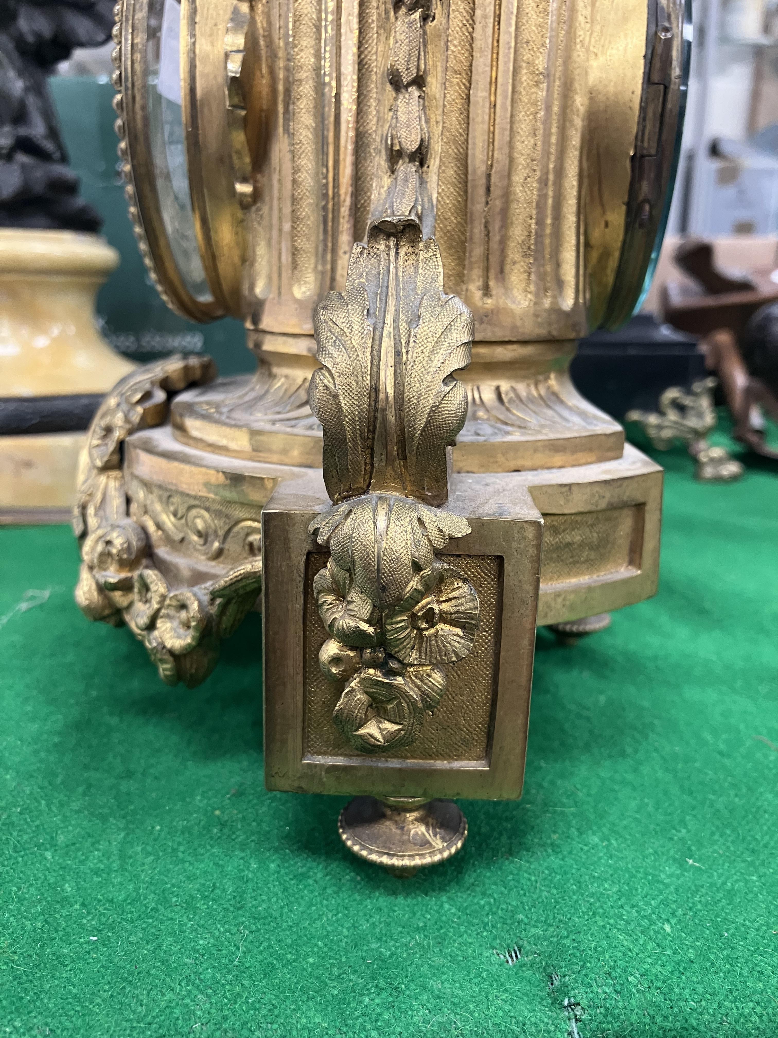 A 19th Century French gilt brass cased mantel clock, - Image 18 of 34