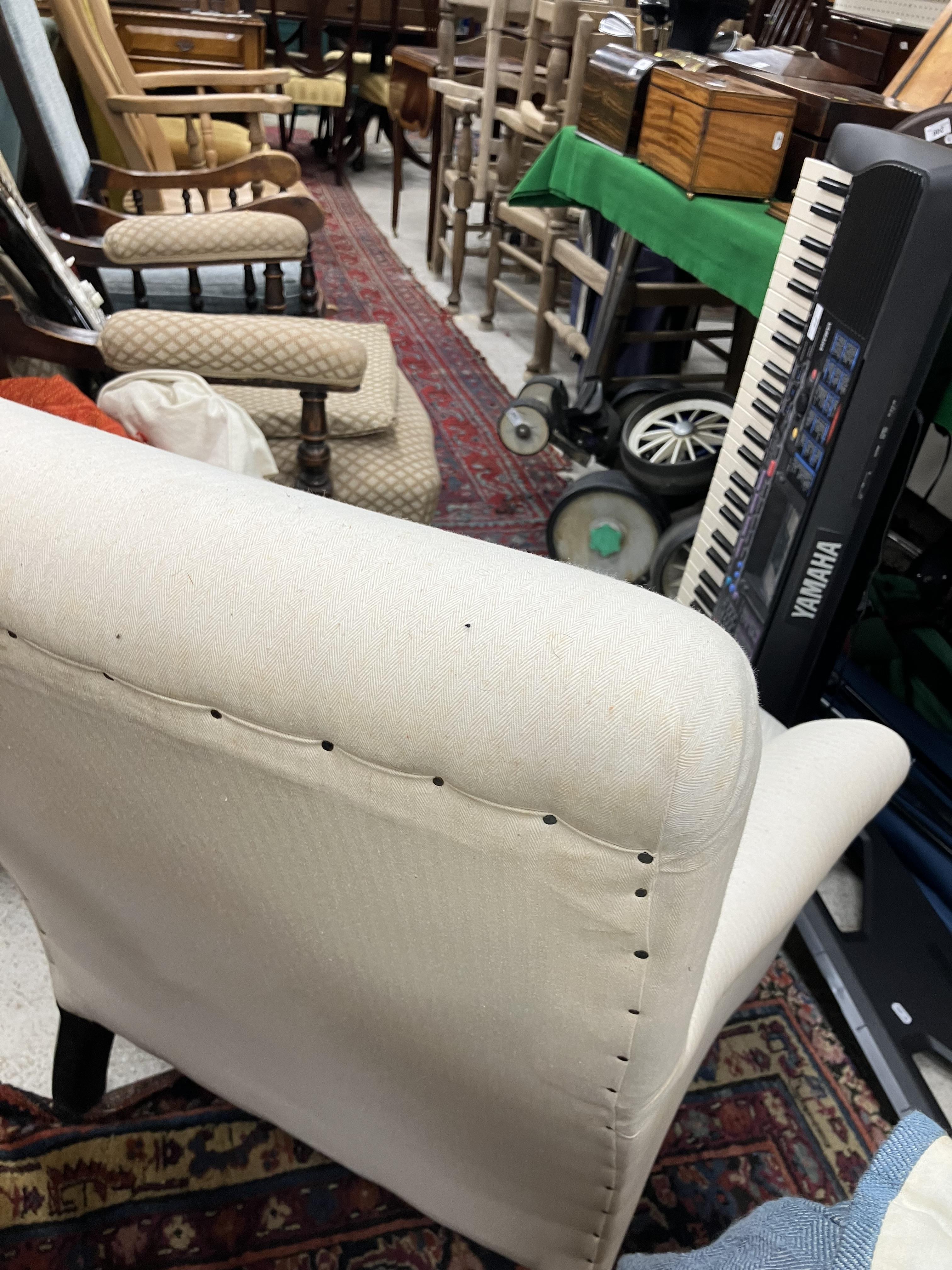 A Victorian upholstered scroll arm chair on ebonised turned front legs to later brass castors, - Image 33 of 52