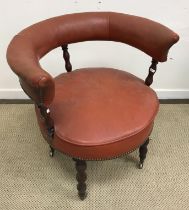 A Victorian mahogany framed brass studded red leather upholstered tub chair,