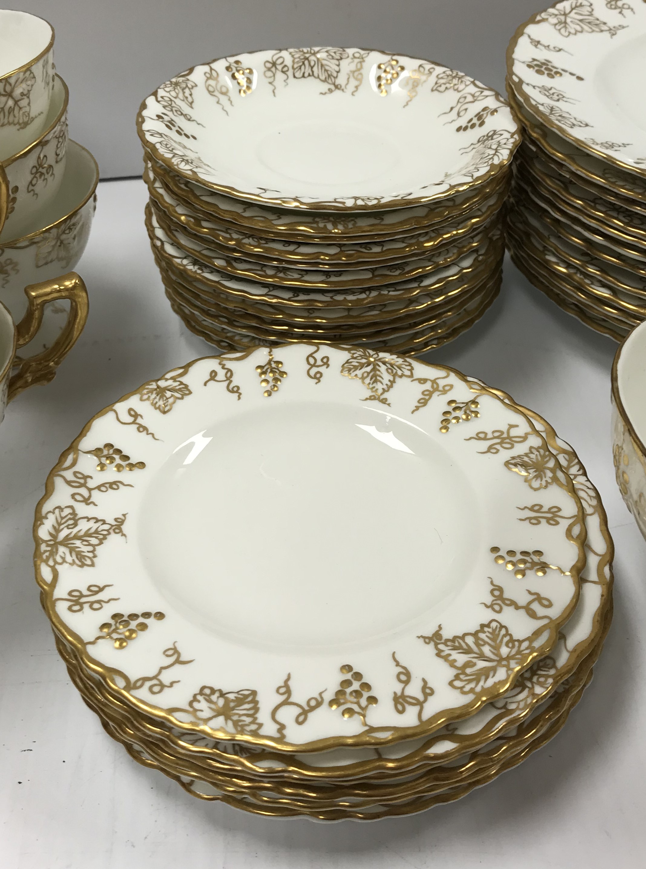 A Royal Crown Derby "Vine" pattern white glazed and gilt decorated tea set, - Image 3 of 5