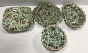 A collection of 19th Century Chinese celadon glazed famille rose dinner wares decorated with