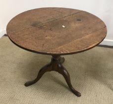 A 19th Century oak tea table,