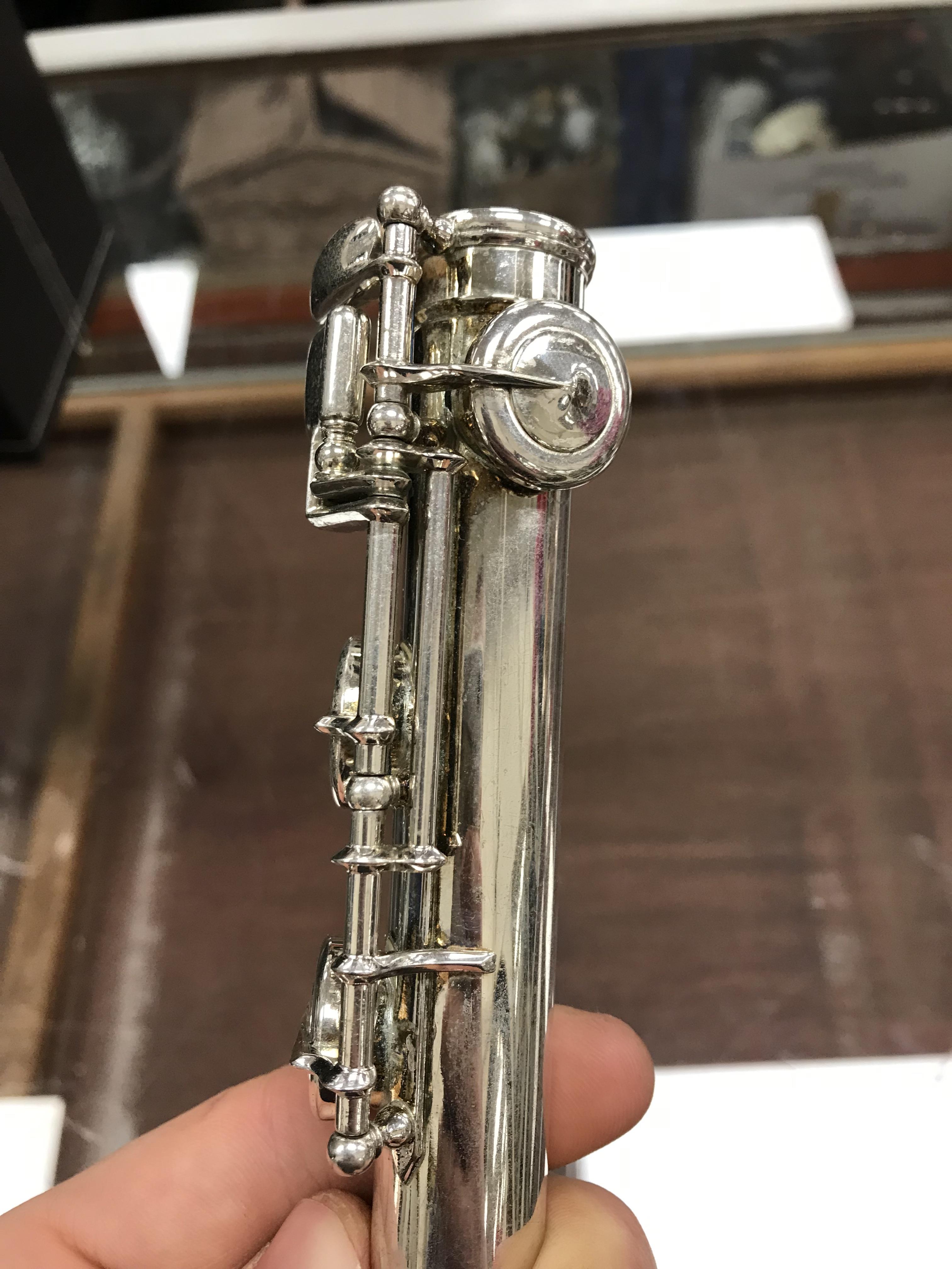 A circa 1947 silver plated flute by Clement Masson bearing engraved maker's mark and date 1947 - Image 16 of 17