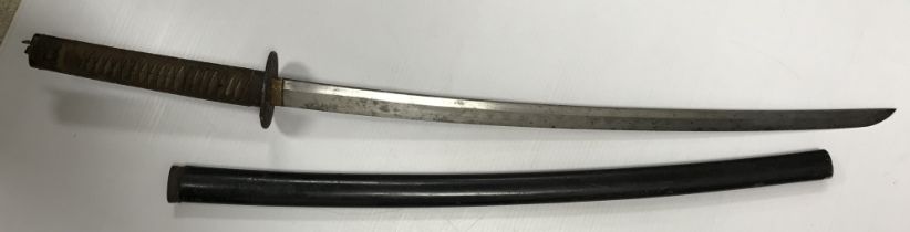 A Japanese katana (probably World War II), the unsigned blade of plain form with faceted top edge,