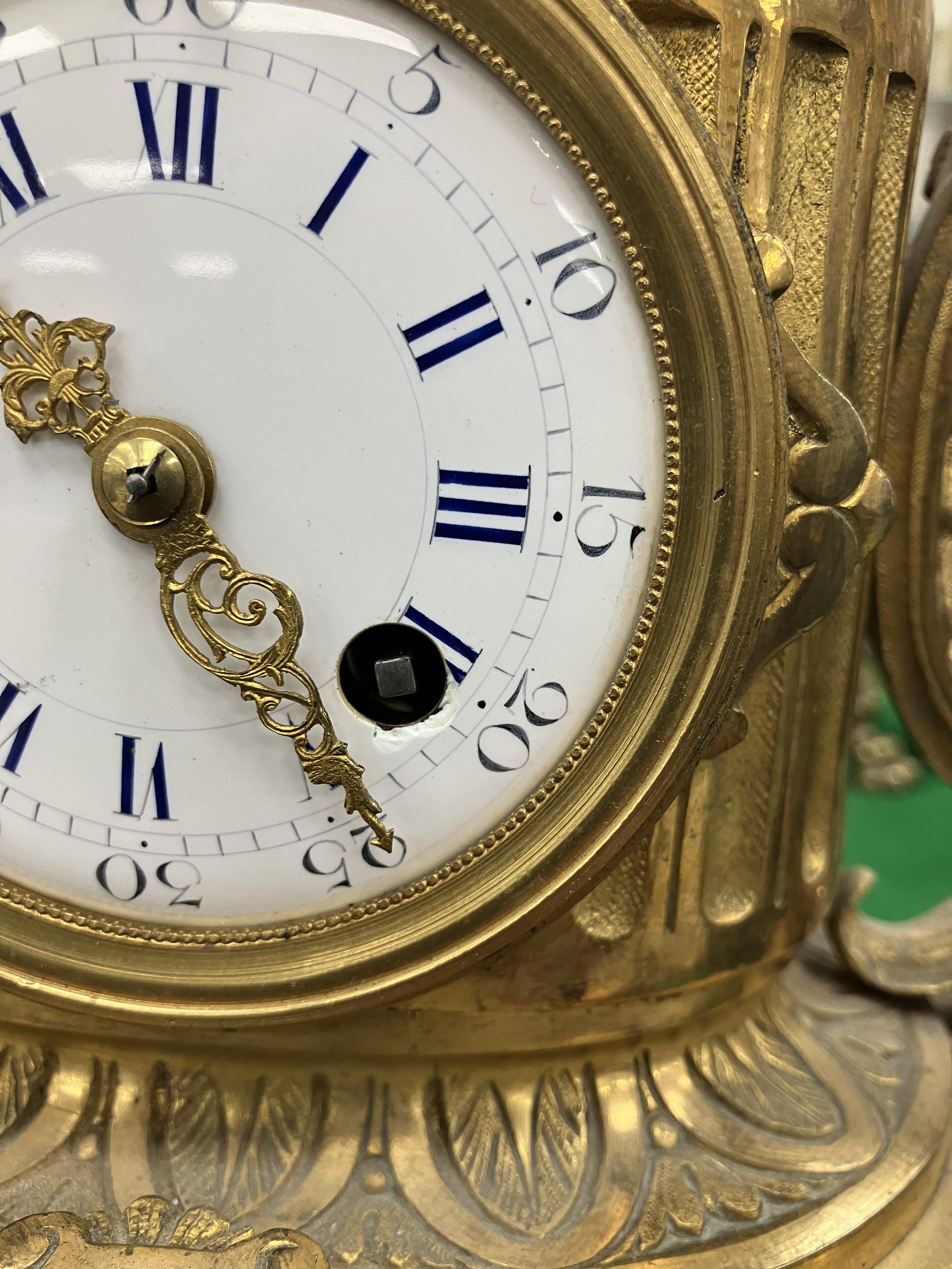 A 19th Century French gilt brass cased mantel clock, - Image 25 of 34
