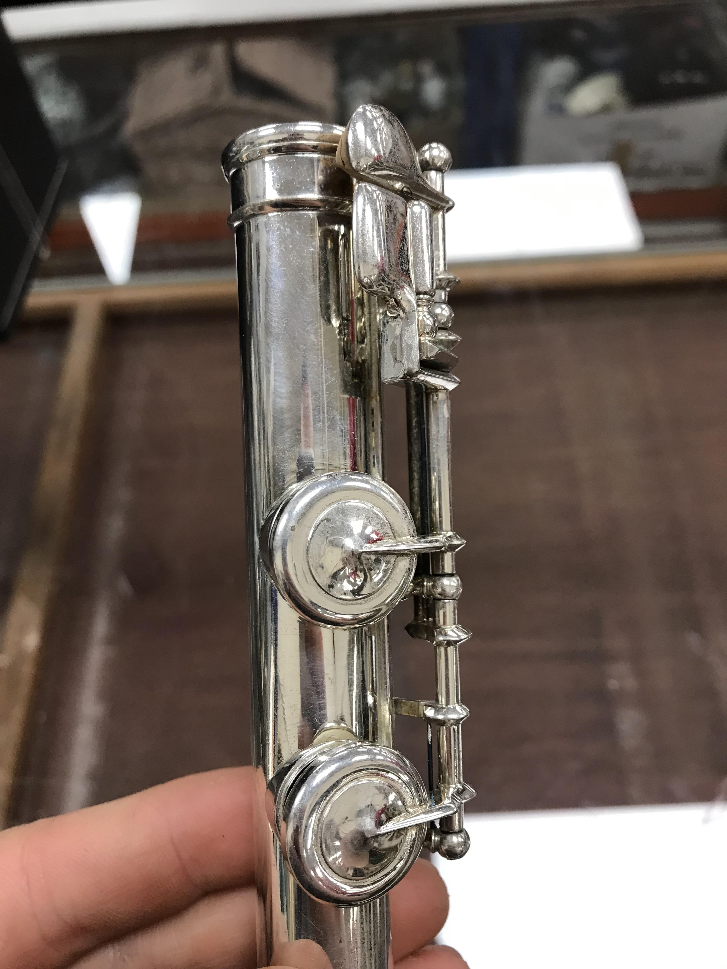 A circa 1947 silver plated flute by Clement Masson bearing engraved maker's mark and date 1947 - Image 17 of 17