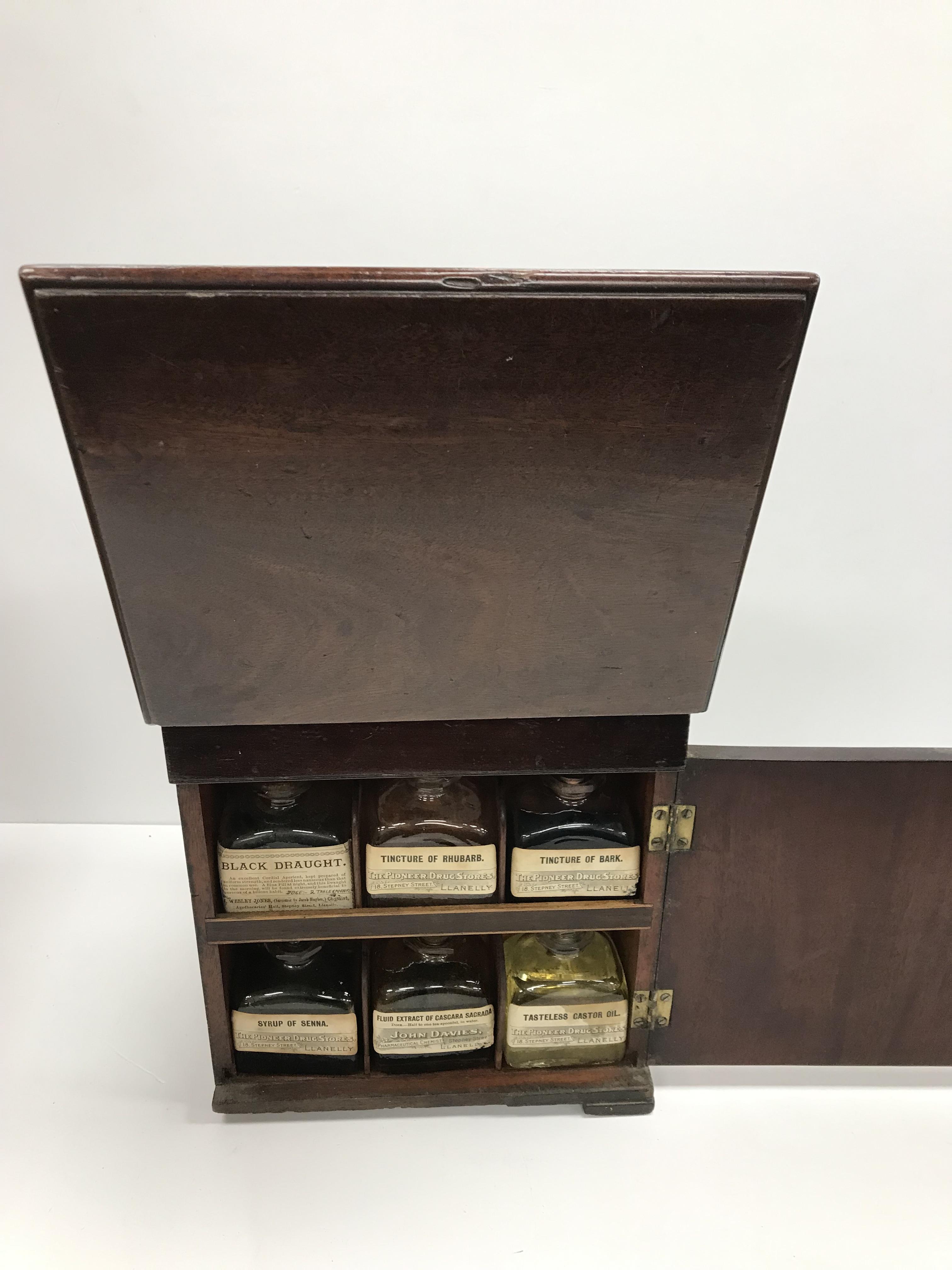 A 19th Century mahogany apothecary box containing various bottles, scales, etc., 23.5 cm wide x 19. - Image 5 of 6