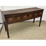 An early 19th Century North Country elm and cross banded dresser,