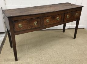 An early 19th Century North Country elm and cross banded dresser,