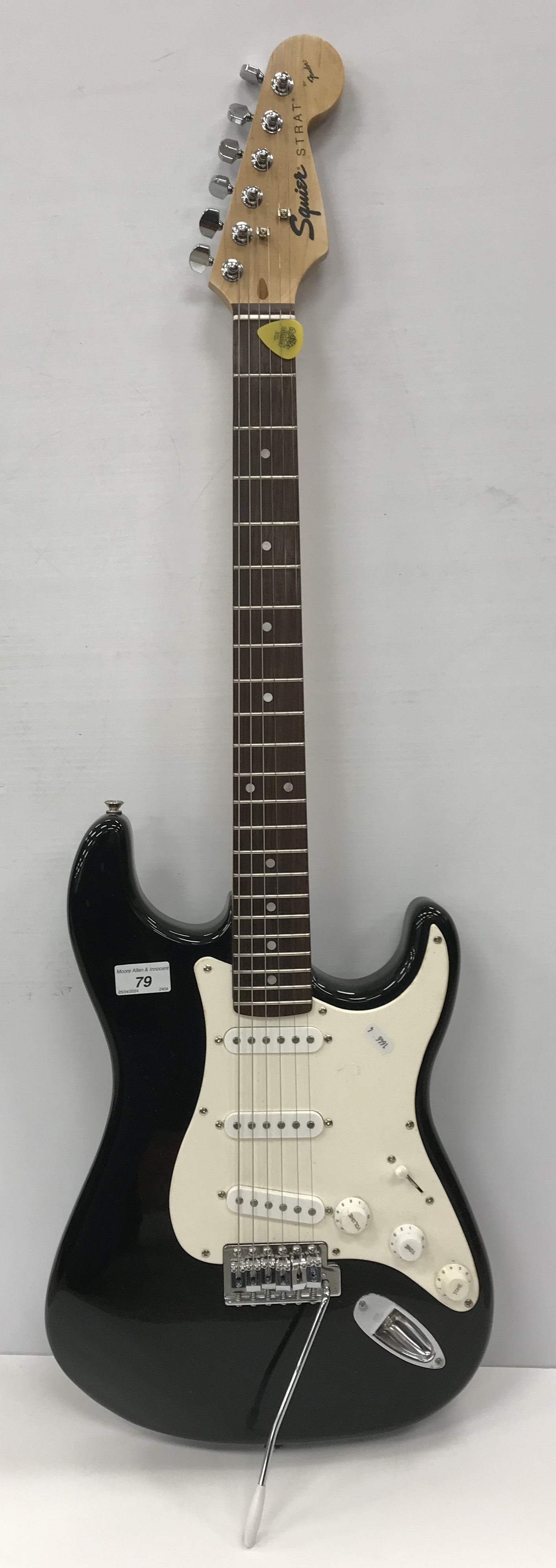 A Fender Squire Strat electric guitar, black with white finger board No.