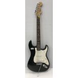 A Fender Squire Strat electric guitar, black with white finger board No.