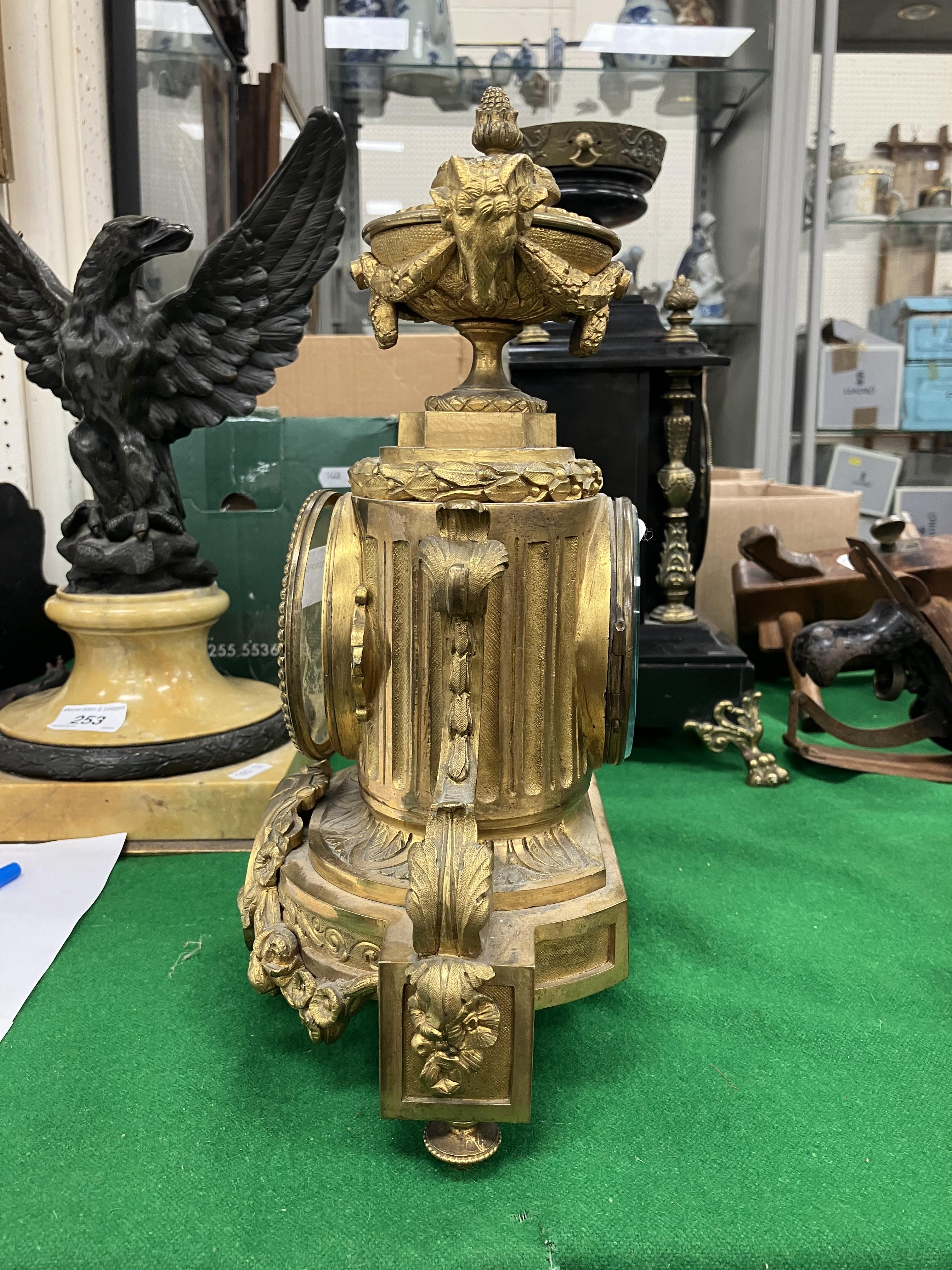 A 19th Century French gilt brass cased mantel clock, - Image 21 of 34