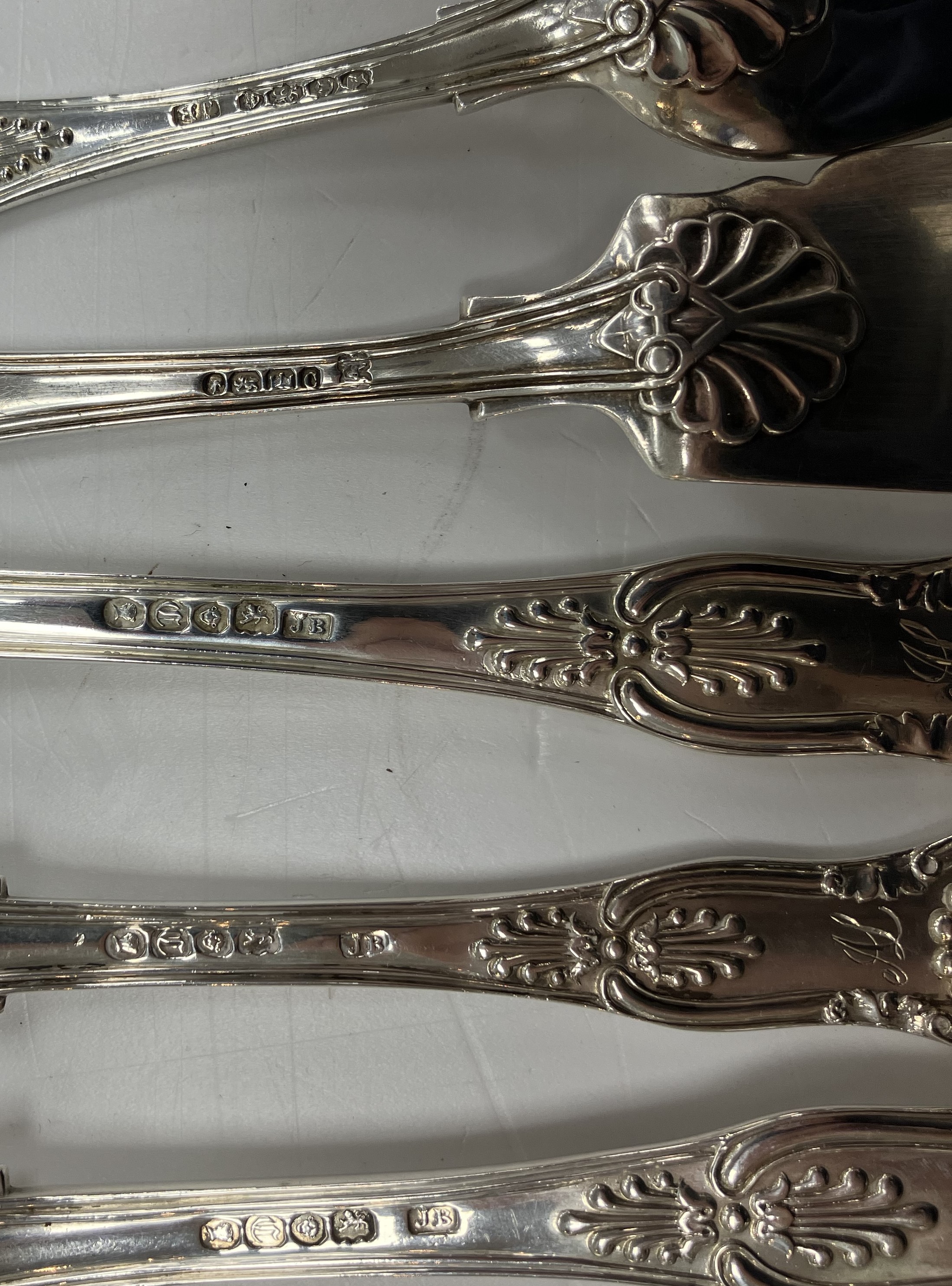 A Victorian King's pattern silver part cutlery canteen comprising eight tea spoons, - Image 2 of 2