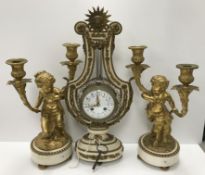 WITHDRAWN A 19th Century French "Lyre" clock garniture, the eight day movement by S.