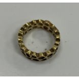 An 18 carat gold dress ring of open work bubble form by John Alistair Donald, 6.