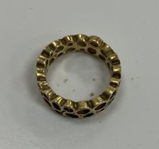 An 18 carat gold dress ring of open work bubble form by John Alistair Donald, 6.