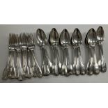 A set of seventeen William IV silver "Fiddle Thread and Shell" pattern dessert spoons (by William