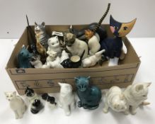 A collection of cat figures to include various Rosenthal examples, a Royal Copenhagen kitten,